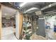 Basement featuring utility equipment and providing access to extra storage space at 5315 Rosslyn Ave, Indianapolis, IN 46220