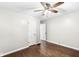 Bedroom featuring a ceiling fan, access to hallway and closet at 5315 Rosslyn Ave, Indianapolis, IN 46220