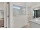 Contemporary bathroom showcasing a frameless glass shower with marble tile, complemented by modern fixtures and finishes at 5353 Hibiscus Dr, Plainfield, IN 46168