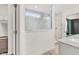 Modern bathroom with a glass enclosed shower and white marble tile at 5353 Hibiscus Dr, Plainfield, IN 46168