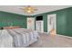 Bright and airy bedroom with ample closet space and a connecting door to the well-lit bathroom at 5353 Hibiscus Dr, Plainfield, IN 46168