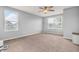 Spacious and bright bedroom with large windows, neutral walls, and plush carpet at 5353 Hibiscus Dr, Plainfield, IN 46168