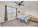 Cozy bedroom with neutral tones, a comfortable bed, and a window providing natural light, creating a relaxing space at 5353 Hibiscus Dr, Plainfield, IN 46168