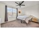 Cozy bedroom with natural light, neutral walls and carpet, and simple decor at 5353 Hibiscus Dr, Plainfield, IN 46168