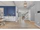 Bright entryway with beautiful floors and a built-in beverage station, providing a welcoming and functional space at 5353 Hibiscus Dr, Plainfield, IN 46168
