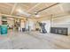 Spacious garage interior with ample storage space, organizational shelves, and high ceilings at 5353 Hibiscus Dr, Plainfield, IN 46168