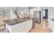 Spacious kitchen with granite countertops, stainless steel appliances, and an inviting island for cooking and gathering at 5353 Hibiscus Dr, Plainfield, IN 46168