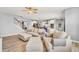 Spacious living room showcasing neutral decor, hardwood floors, and an open layout at 5353 Hibiscus Dr, Plainfield, IN 46168