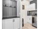 Stylish mud room with designer touches, built-in storage, modern finishes and functional design at 5353 Hibiscus Dr, Plainfield, IN 46168