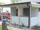 Charming covered back porch is perfect for entertaining or relaxing outdoors at , Indianapolis, IN 46218