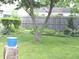 Lush backyard with a mature tree and landscaping offers tranquility at , Indianapolis, IN 46218
