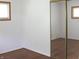 Bedroom showcases hardwood floors and sliding mirror closet doors for ample storage at , Indianapolis, IN 46218