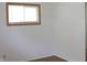Bright bedroom features a window with wood trim and a neutral color palette at , Indianapolis, IN 46218