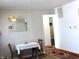 Cozy dining area with table, chairs, and a view into another room at , Indianapolis, IN 46218