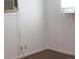 Empty room with hardwood floors, neutral walls, and a window with shelf at , Indianapolis, IN 46218