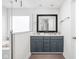This bathroom features a dual sink vanity, a separate shower, and a soaking tub at 630 Dorman St, Indianapolis, IN 46202