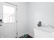 Practical laundry room with a utility sink, and ample space at 630 Dorman St, Indianapolis, IN 46202