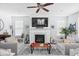 Cozy living room features a fireplace, comfortable seating, and a relaxing atmosphere at 630 Dorman St, Indianapolis, IN 46202
