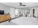 Relax in this large main bedroom featuring an ensuite and walk-in closet with contemporary stylings at 630 Dorman St, Indianapolis, IN 46202