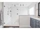 A stylish walk-in shower is accented with subway tile and modern fixtures at 630 Dorman St, Indianapolis, IN 46202