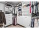 This large walk-in closet provides ample storage with built-in shelving and drawers at 630 Dorman St, Indianapolis, IN 46202