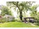 Spacious backyard featuring a charming pergola and outdoor seating area at 6379 Monitor Dr, Indianapolis, IN 46220