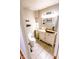 Charming bathroom with a unique vessel sink, a tiled floor, and vintage fixtures at 6379 Monitor Dr, Indianapolis, IN 46220