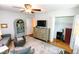 Comfortable bedroom with ceiling fan, dresser, area rug, closet, and natural light from the window at 6379 Monitor Dr, Indianapolis, IN 46220