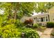 Charming home featuring beautiful landscaping, a well-maintained yard, and curb appeal at 6379 Monitor Dr, Indianapolis, IN 46220