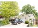 Charming beige home with a one car garage and a well-maintained lawn at 6379 Monitor Dr, Indianapolis, IN 46220
