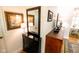 Entryway hallway with foyer table, decorative mirror, and stylish lighting at 6379 Monitor Dr, Indianapolis, IN 46220