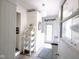 Cozy mudroom with ample storage, beadboard paneling, and a bright, welcoming atmosphere at 6379 Monitor Dr, Indianapolis, IN 46220