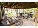 Comfortable outdoor space with patio furniture, overhead string lights, and ceiling fan at 6379 Monitor Dr, Indianapolis, IN 46220