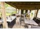 Picturesque outdoor space with a well-equipped dining area and a covered seating area at 6379 Monitor Dr, Indianapolis, IN 46220