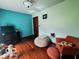 The bedroom features a wooden floor and furniture at 6546 Derbyshire Rd, Indianapolis, IN 46227