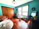 The bedroom features a wooden floor and furniture at 6546 Derbyshire Rd, Indianapolis, IN 46227
