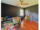 This bedroom features two twin beds and a window at 6546 Derbyshire Rd, Indianapolis, IN 46227