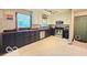 Updated kitchen with stainless steel appliances, ample counter space, and a bright, airy atmosphere at 6546 Derbyshire Rd, Indianapolis, IN 46227