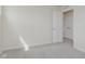 Bedroom featuring neutral carpeting, a window, and a closet with double doors at 7282 Shroyer Way, Noblesville, IN 46062