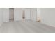 Large bedroom with neutral carpeting, closet, and multiple doorways at 7282 Shroyer Way, Noblesville, IN 46062