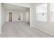 Spacious bedroom with neutral carpeting, closet, and large window at 7282 Shroyer Way, Noblesville, IN 46062