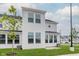 View of the back exterior elevation of the building with a grassy yard at 7282 Shroyer Way, Noblesville, IN 46062