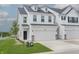 Charming two-story home with a white exterior, a two-car garage, and a well-maintained lawn at 7282 Shroyer Way, Noblesville, IN 46062