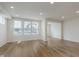 Spacious living area with hardwood floors and large windows at 7282 Shroyer Way, Noblesville, IN 46062