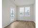 Cozy sun room featuring hardwood flooring and natural light at 7282 Shroyer Way, Noblesville, IN 46062