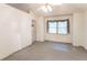 Bright bedroom featuring a ceiling fan and a large window at 7303 W Division Rd, Bargersville, IN 46106