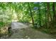 Wooden bridge going into the forest at 7303 W Division Rd, Bargersville, IN 46106