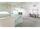 Spacious living room featuring a fireplace, ceiling fan, and staircase leading to the upper level at 7303 W Division Rd, Bargersville, IN 46106