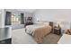 Spacious bedroom with neutral carpet, large window, and ample closet space at 772 Cembra Dr, Greenwood, IN 46143