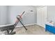 Bright bedroom featuring neutral carpet and an accent wall at 772 Cembra Dr, Greenwood, IN 46143